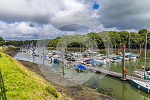 A view up Westfield Pill showing boats moored at Neyland, Pembrokeshire, South Wales