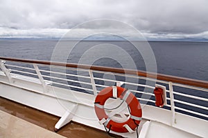 View from upper deck of modern cruise ship showing lifesaver photo