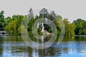 View of Upper Pond and Pink Pavilion on island of Anti-Circe island of love in Sofiyivka park in Uman, Ukraine