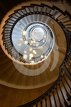 view upward  spiral staircase with beautiful light