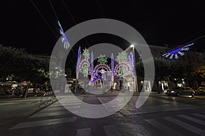 View of an urban landscape with street decorated with illuminations