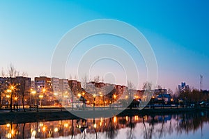 View Of Urban Residential Area Overlooks To City Lake Park Evening