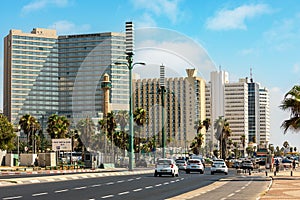 View of urban road and modern hotel buildings on background in Tel Aviv, Israel.