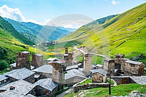 View of the Ushguli village at the foot of Mt. Shkhara. Picturesque and gorgeous scene. Rock towers and old houses in Ushguli,