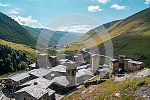 View of the Ushguli village at the foot of Mt. Shkhara. Picturesque and gorgeous scene. Rock towers and old houses in Ushguli,