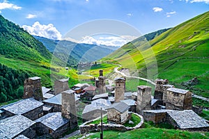 View of the Ushguli village at the foot of Mt. Shkhara. Picturesque and gorgeous scene. Rock towers and old houses in Ushguli,