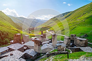 View of the Ushguli village at the foot of Mt. Shkhara. Picturesque and gorgeous scene. Rock towers and old houses in Ushguli,