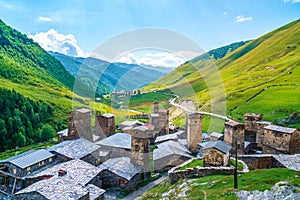 View of the Ushguli village at the foot of Mt. Shkhara. Picturesque and gorgeous scene. Rock towers and old houses in Ushguli,