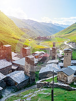 View of the Ushguli village at the foot of Mt. Shkhara. Picturesque and gorgeous scene. Rock towers and old houses in Ushguli,