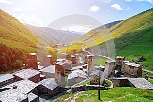 View of the Ushguli village at the foot of Mt. Shkhara. Picturesque and gorgeous scene. Rock towers and old houses in Ushguli,