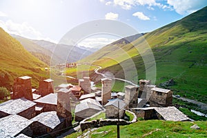 View of the Ushguli village at the foot of Mt. Shkhara. Picturesque and gorgeous scene. Rock towers and old houses in Ushguli,