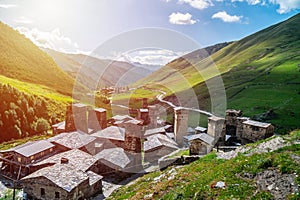 View of the Ushguli village at the foot of Mt. Shkhara. Picturesque and gorgeous scene. Rock towers and old houses in Ushguli,