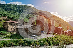 View of the Ushguli village at the foot of Mt. Shkhara. Picturesque and gorgeous scene. Rock towers and old houses in Ushguli,