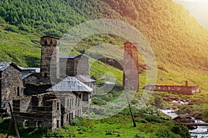 View of the Ushguli village at the foot of Mt. Shkhara. Picturesque and gorgeous scene. Rock towers and old houses in Ushguli,