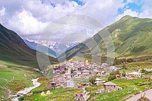 View of the Ushguli village at the foot of Mt. Shkhara. Picturesque and gorgeous scene. Rock towers and old houses in Ushguli,