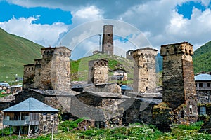 View of the Ushguli village at the foot of Mt. Shkhara. Picturesque and gorgeous scene. Rock towers and old houses in Ushguli,