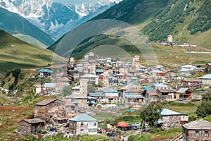 View of the Ushguli village at the foot of Mt. Shkhara. Picturesque and gorgeous scene. Rock towers and old houses in Ushguli,