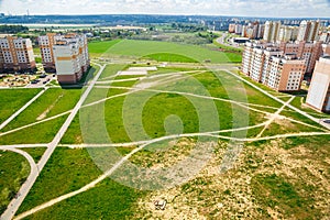 A view of the vacant lot between the apartment buildings