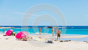 View of vacationers on Camps Bay beach, Cape Town.