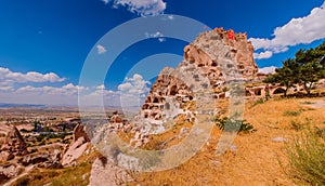 View on a valley in Cappadocia area and Uchisar castle