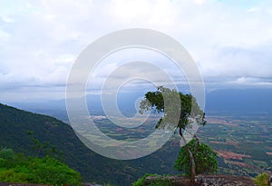 View of Valley and Greenery from Top of Mountain with Clouds in Sky, Western Ghats, India