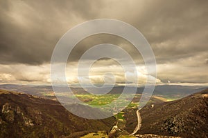 a view of the valley of Norcia, italy, in a stormy morning of june