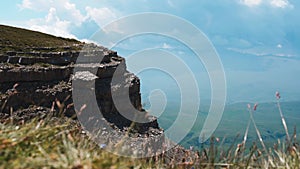 View of the valley and rock from the top of the plateau. Caucasian ridge