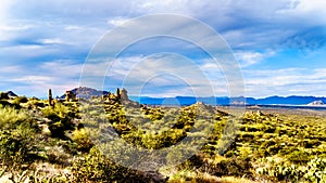View of the Valley of the Sun and the rugged rocky mountains in the McDowell Mountain Range viewed from th