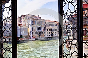 View through a Venetian window at the Canal Grande