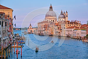 View of Venice Grand Canal and Santa Maria della Salute church on sunset