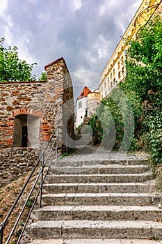 View of Veste Oberhaus castle. Inner courtyard of medieval castle with gates and arches, Passau, Germany. Vertical photo