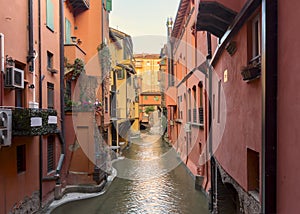 View from Via Piella of the Finestrella on the Canale delle Moline, one of the city`s underground canals photo