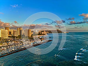 View of a vibrant cityscape of Diamond Head Sunset, Waikiki, Hawai'i