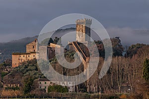 View of Vicopisano, Pisa, Italy, in early morning light, with fog in the background