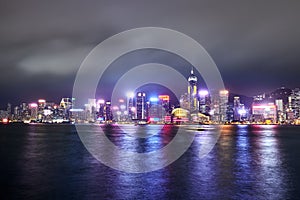 View of Victoria Harbor and Hong Kong at night. Urban landscape