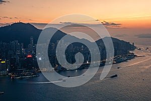 View on Victoria harbor in Hong Kong at sunset