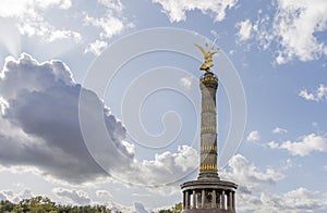 View of the Victory Column against a dramatic sky, Berlin, Germany