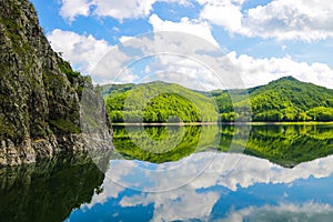 View of Vidraru Dam is a dam in Romania. It was completed in 1966 on the Arge River and creates Lake Vidraru. The arch dam was