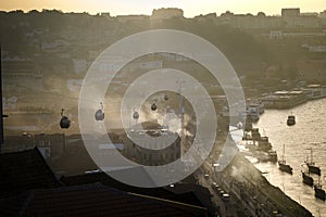 View of Vila Nova de Gaia and Douro river in amazing foggy sunset, Porto, Portugal.