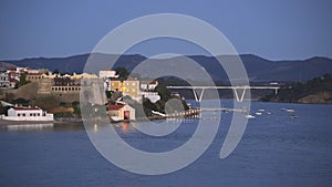 View of Vila Nova de Milfontes with river Mira at night, Portugal