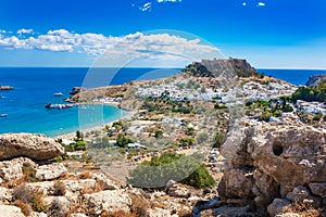 View of village, bay and Acropolis of Lindos Rhodes, Greece