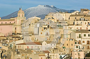 View of village and belltower on background Etna photo