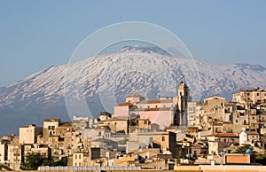 View of village and belltower on background Etna photo