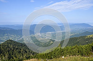 View of the village of Kolochava from the top of Mount Strymba. Carpathian Mountains photo