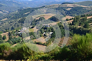 View Of The Village Of Rebedul From The Top Of The Meadows Of The Mountains Of Galicia. Travel Flowers Nature.