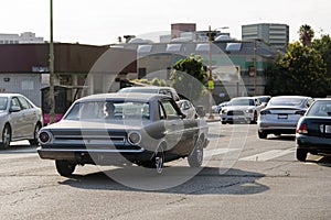 A view of a vintage classic car van in the street