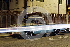 A view of a vintage classic car van in the street