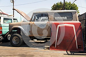 A view of a vintage classic car van in the street