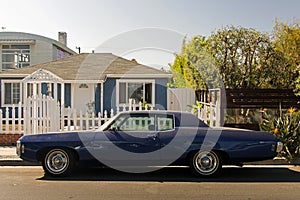 A view of a vintage classic car van in the street