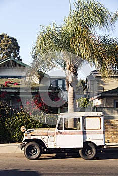 A view of a vintage classic car van in the street